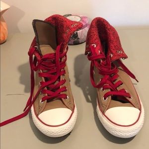 All Star Converse.  Brown with red laces.